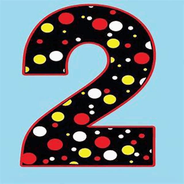 the number two is decorated with red , yellow , white and red polka dots .