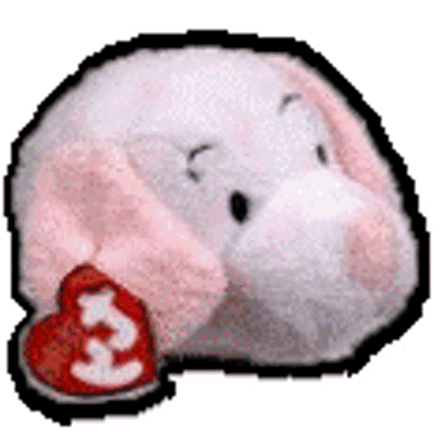 a pink and white stuffed animal with a red heart on its ear .