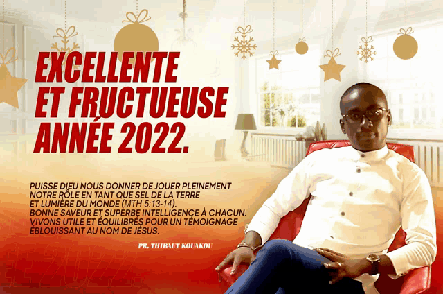 a man is sitting in a chair with the words excellente et fructueuse annee 2022 below him