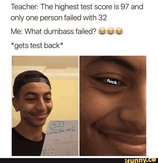 a man holding a test that says 32 on it