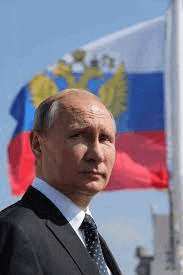 president putin is standing in front of a russian flag .