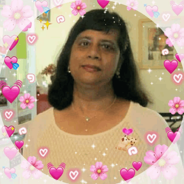 a woman in a white shirt is surrounded by pink hearts and pink flowers