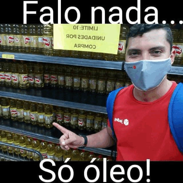 a man wearing a mask points to a sign that says " falo nada "