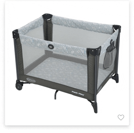 a graco pack-n-play crib with a heart in the corner