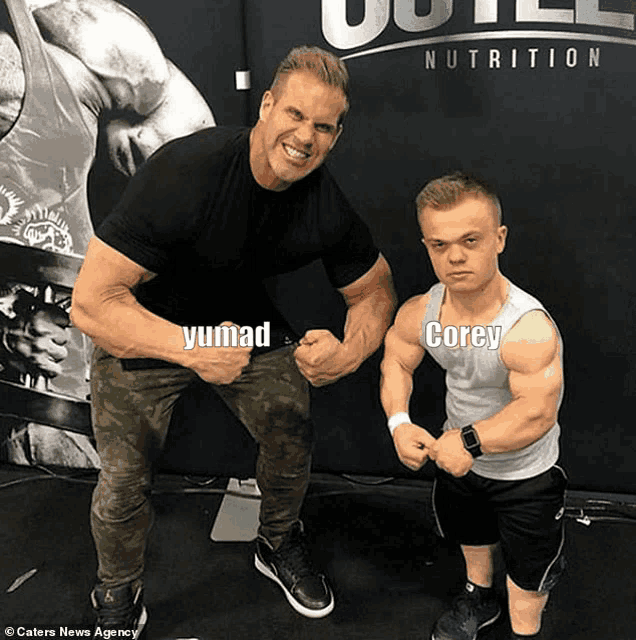 a muscular man and a smaller man are posing for a picture in front of a sign that says nutrition