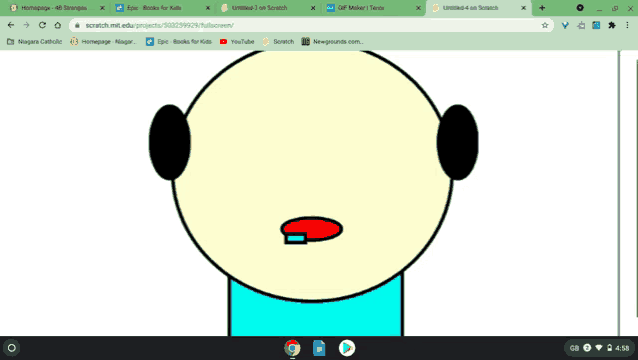 a computer screen shows a cartoon face with a red mouth