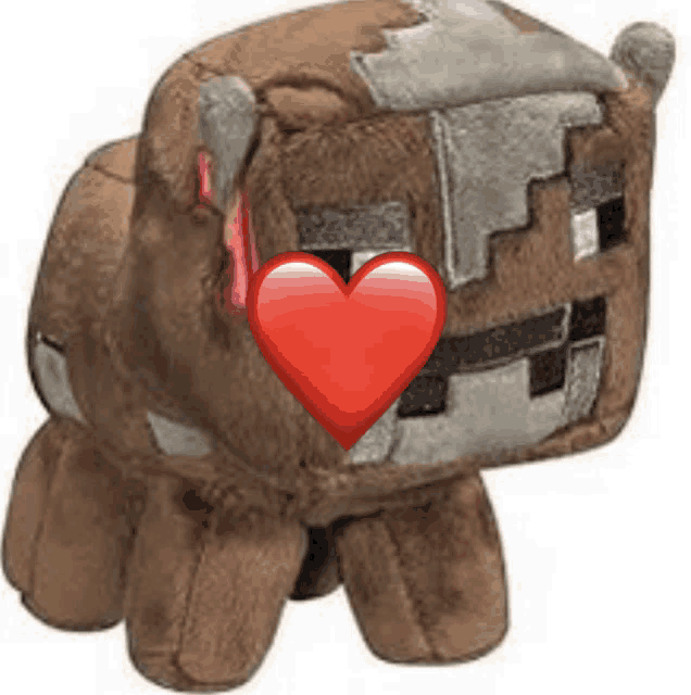 a stuffed animal with a red heart on it 's face