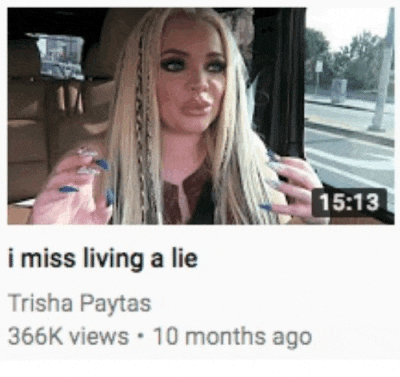 a video of a woman with dreadlocks is titled i miss living a lie