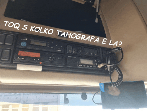 a dashboard of a truck with the words toq s kolko tahografa e la on it