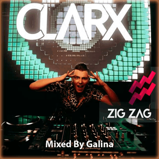 a man standing in front of a mixer that says clarx