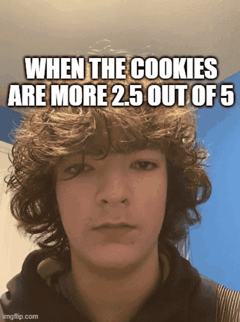 a picture of a young man with a caption that says when the cookies are 2.5 out of 5