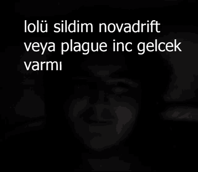 a blurred image of a man with the words loli sildim novadrift veya plague inc gelcek varmi