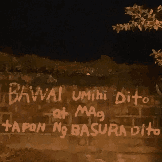 a brick wall with graffiti on it that says " bavval umihi dito "