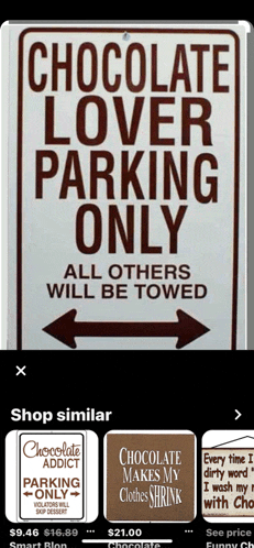 a sign that says " chocolate lover parking only all others will be towed "