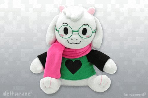 a stuffed sheep with glasses and a pink scarf from deltarune