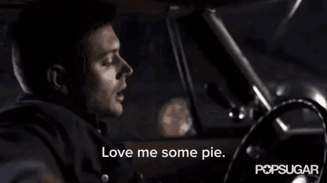 a man in a car with the words love me some pie