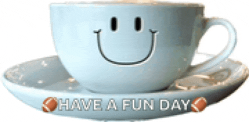 a cup with a smiley face and the words have a fun day on it