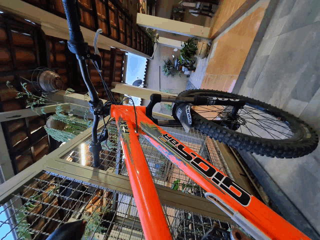 a close up of a bicycle with the word cross on the side