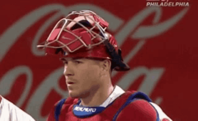 a philadelphia baseball player wearing a helmet