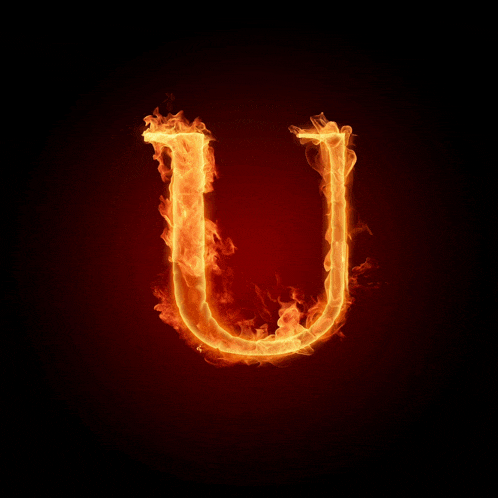 the letter u is covered in flames on a dark background