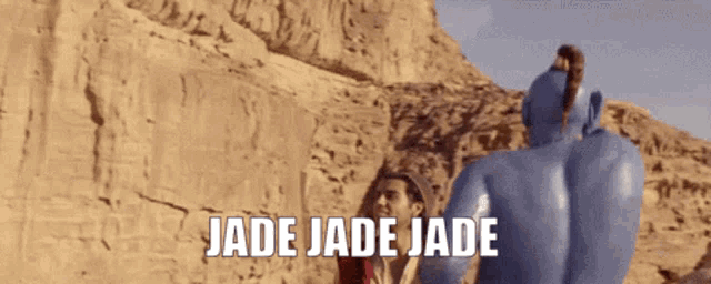 a genie is standing in the desert with the words jade jade jade behind him