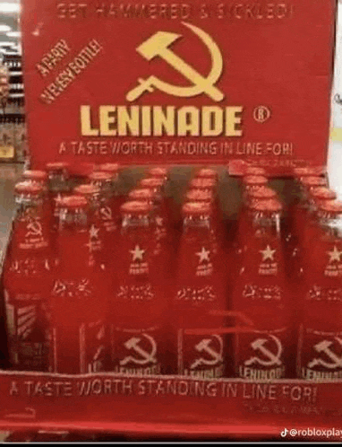 a display of red bottles of leninade with a hammer and sickle on the label .