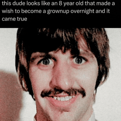 a man with a mustache looks like an 8 year old