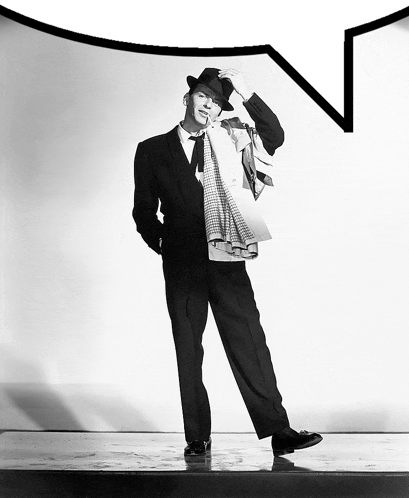 a black and white photo of a man in a suit with a speech bubble in the background