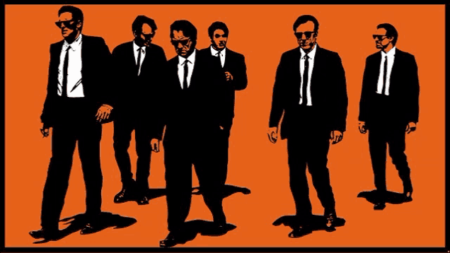 a group of men in suits and ties standing next to each other on an orange background