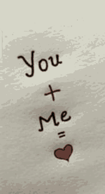 a piece of paper that says you + me with a red heart in the middle