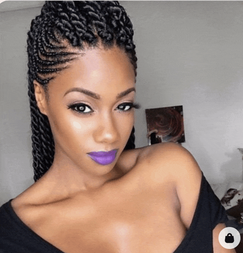 a woman with braids and purple lips is wearing a black top