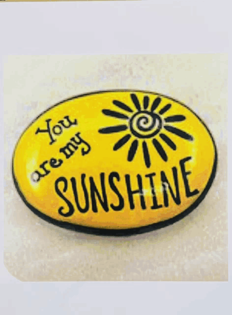 a yellow sign that says you are my sunshine on it