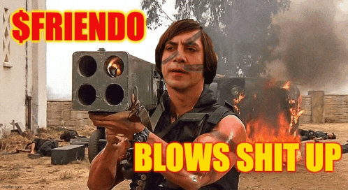 a man is holding a rocket launcher in front of a burning building and says " $friendo blows shit up " .