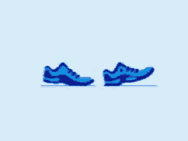 a pair of blue shoes are walking on a blue background .