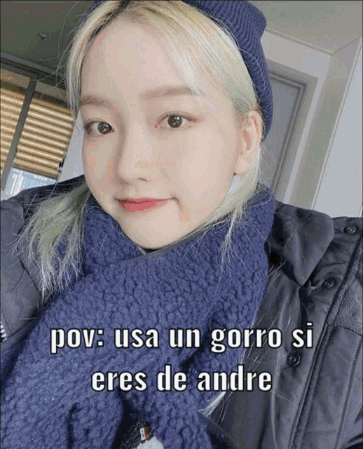 a woman wearing a blue scarf and a beanie has a caption that says pov usa un gorro si eres de andre