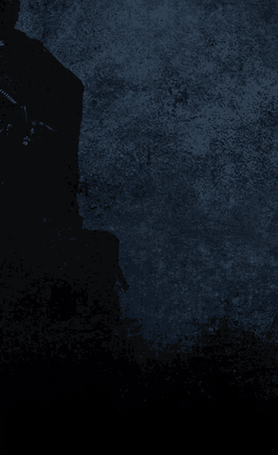 a dark blue background with a few white spots