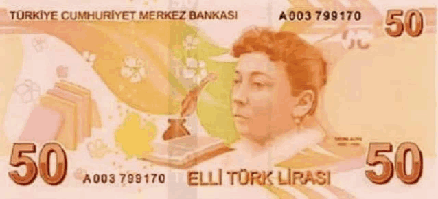 a 50 elli turk lirasi banknote with a woman 's face on it