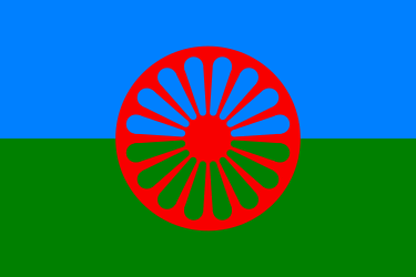 a gypsy flag with a red wheel on a blue and green background