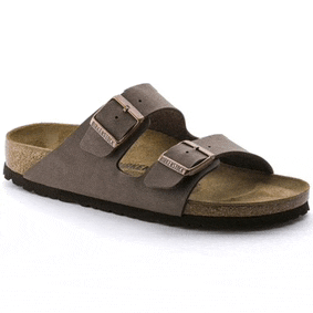 a pair of brown birkenstock sandals with two buckles on the side