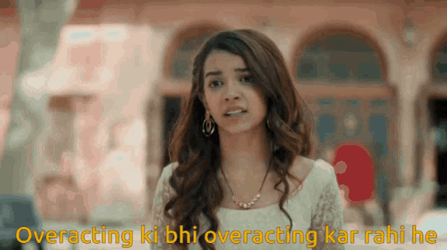 a woman in a white dress with the words overacting ki bii overacting kar rahi he