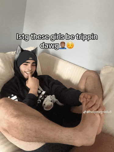 a man laying on a couch with a caption that says ' istg these girls be trippin dawg '