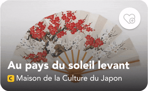 a fan with red and white flowers on it and the words au pays du soleil levant maison de la culture du japon