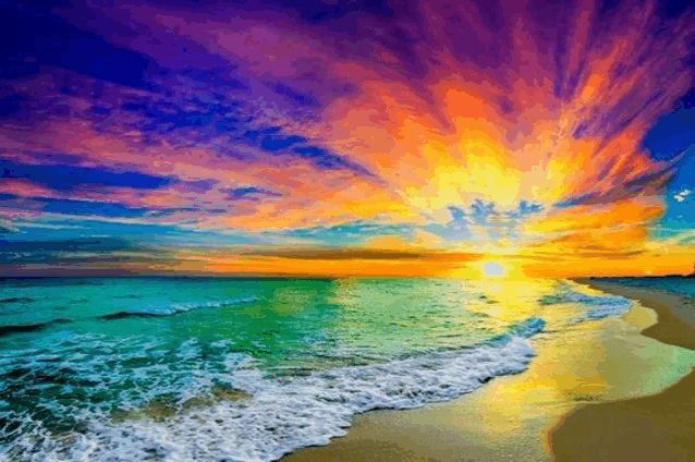 a colorful sunset over a beach with waves crashing on the sand