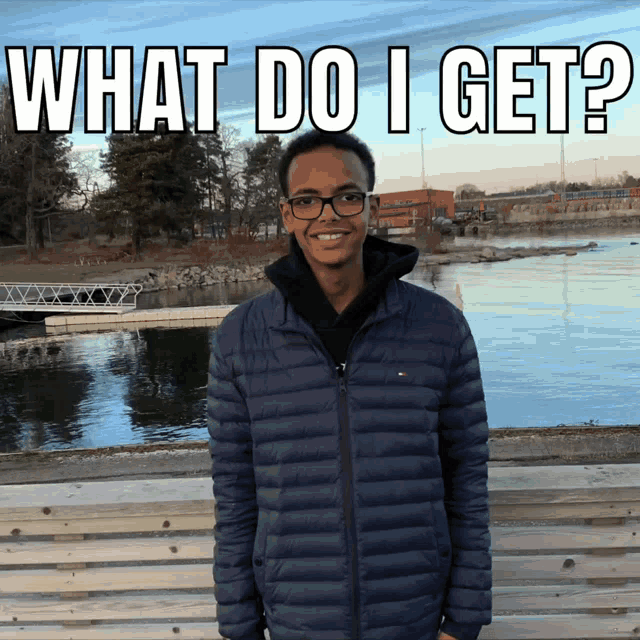 a young man stands in front of a body of water with the words " what do i get " written above him