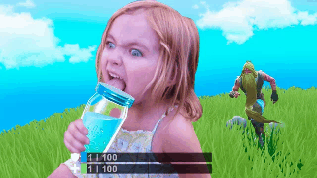 a little girl drinking from a bottle with the number 11100 on the bottom