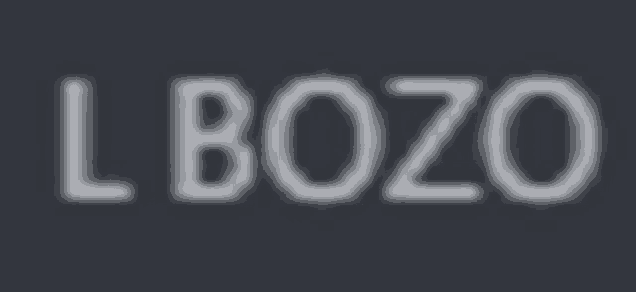 a blurred image of the word bozo on a dark background