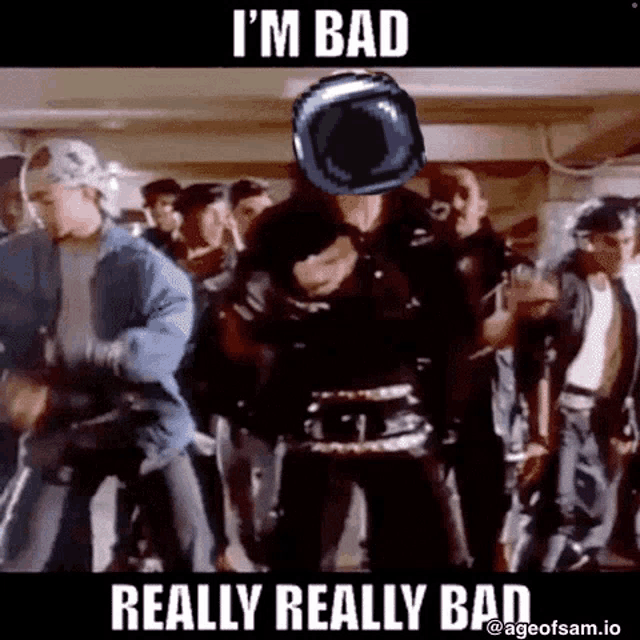 a group of people are dancing in a room and one of them is wearing a helmet that says i 'm bad