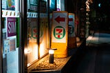 The exterior of a 7 Eleven at night