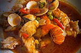 A photo of the author’s Spanish dish ‘Zarzuela’ containing monkfish, prawns and clams