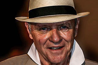 Photo of actor Sir Anthony Hopkins wearing a straw hat